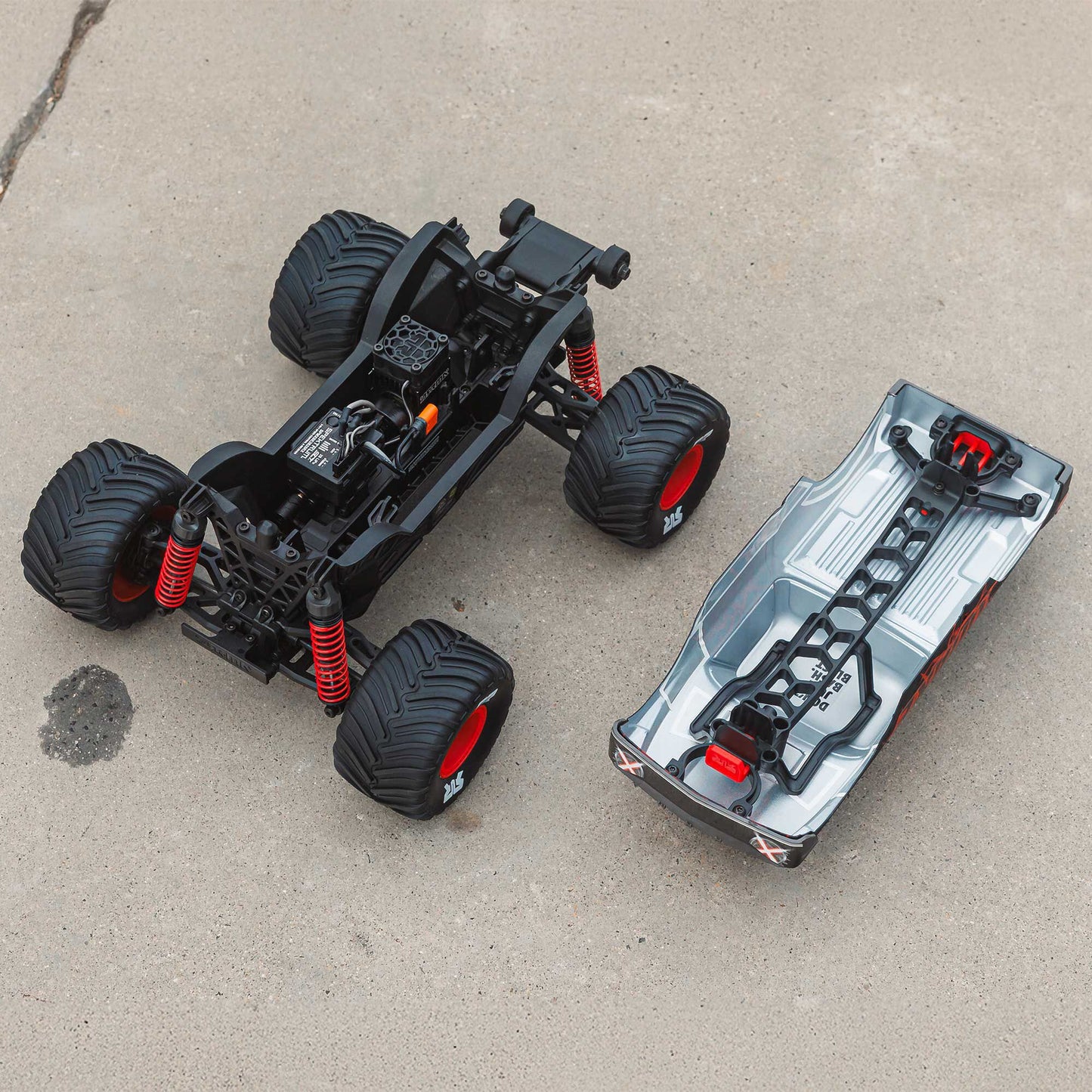 1/16 Quake Grom 4x4 RTR Brushed Monster Truck, Red - Battery & Charger Included PREORDER