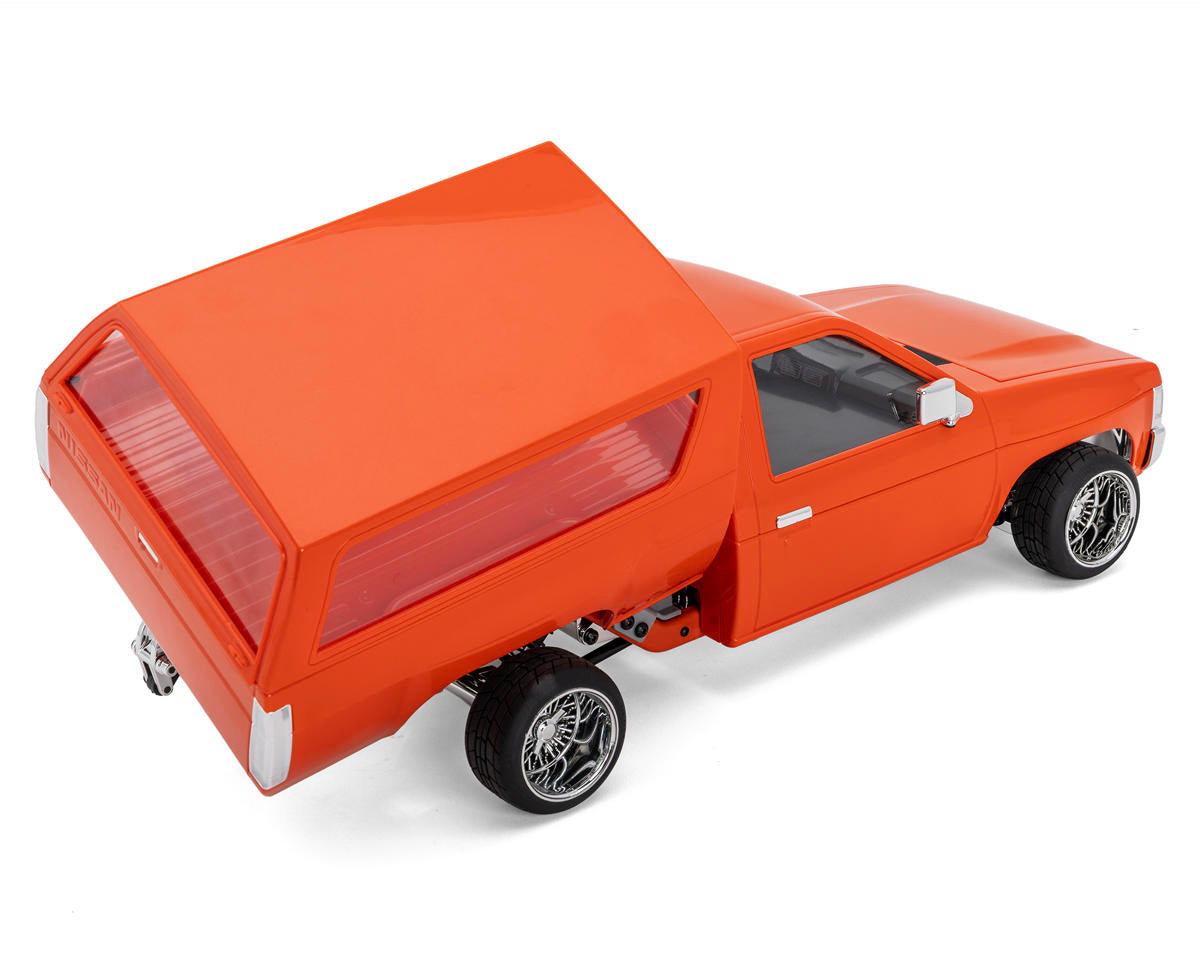 Founders Edition 1993 Nissan Hardbody 1/10 RTR Bed Dancer (Orange) w/2.4GHz Radio