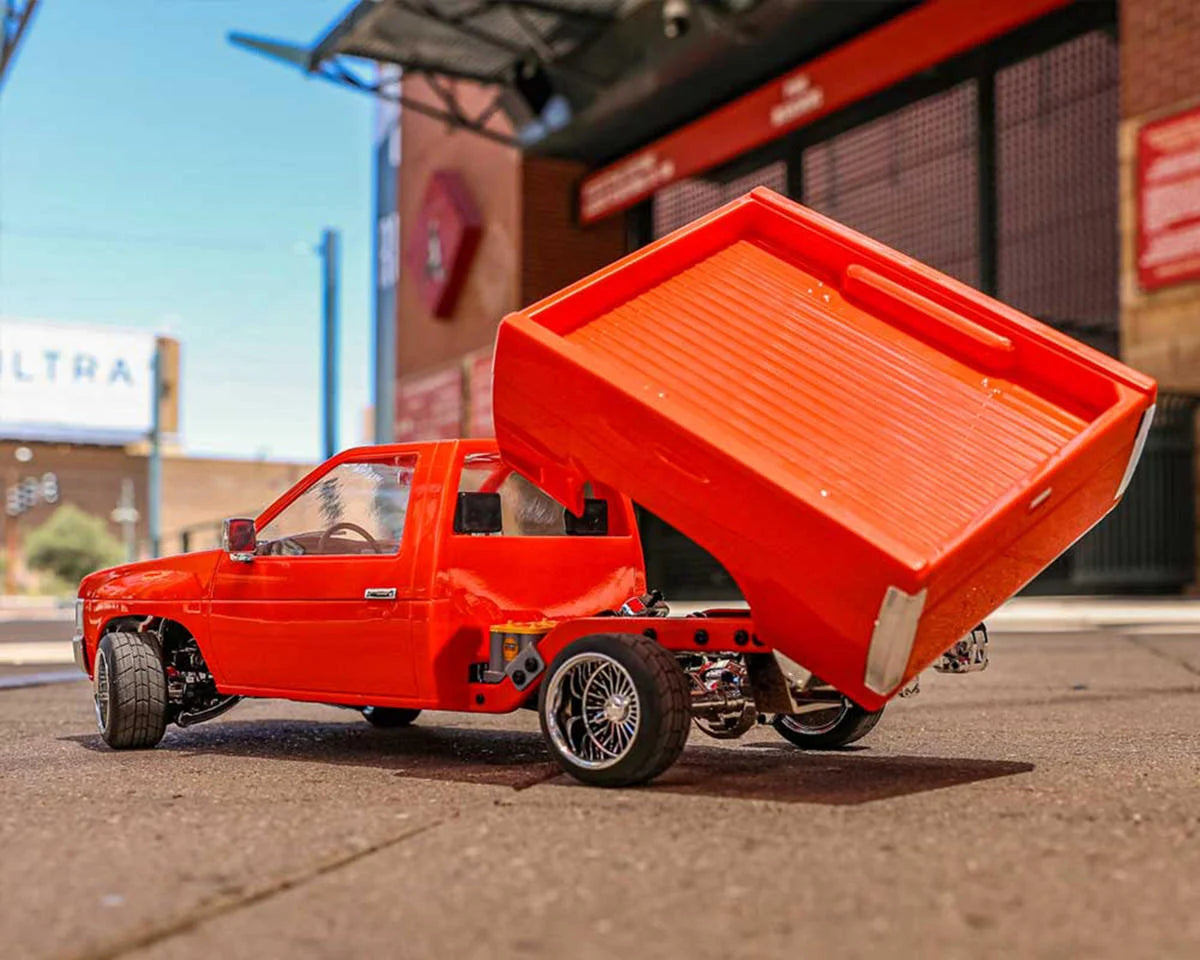 Founders Edition 1993 Nissan Hardbody 1/10 RTR Bed Dancer (Orange) w/2.4GHz Radio