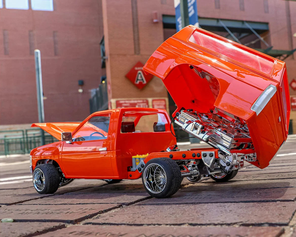Founders Edition 1993 Nissan Hardbody 1/10 RTR Bed Dancer (Orange) w/2.4GHz Radio